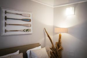 Postel nebo postele na pokoji v ubytování Calefati SUITE 54