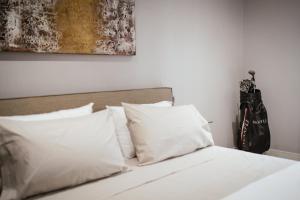 Postel nebo postele na pokoji v ubytování Calefati SUITE 54