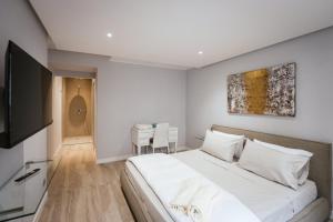 Postel nebo postele na pokoji v ubytování Calefati SUITE 54