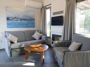 Setusvæði á Sea breeze suites Mistral 4 per with private pool