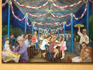 a painting of a group of people in a carousel at Hotel Villa de Minas in Monte Sião