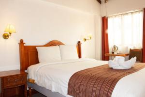 Letto o letti in una camera di Hotel Amerinka