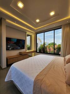 Uma cama ou camas num quarto em Alto Padrón. Para exigentes