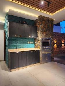 A cozinha ou kitchenette de Alto Padrón. Para exigentes
