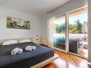 Postel nebo postele na pokoji v ubytování Holiday Home Lana by Interhome