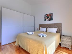 Postel nebo postele na pokoji v ubytování Holiday Home Lana by Interhome