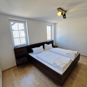 Ein Bett oder Betten in einem Zimmer der Unterkunft DM Hotels & Apartments - Apartment Pfarrgasse 09