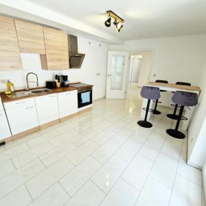 Küche/Küchenzeile in der Unterkunft DM Hotels & Apartments - Apartment Pfarrgasse 09