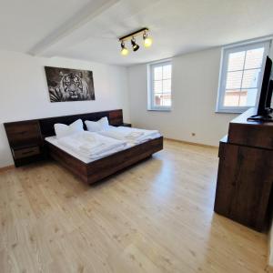 Ein Bett oder Betten in einem Zimmer der Unterkunft DM Hotels & Apartments - Apartment Pfarrgasse 09