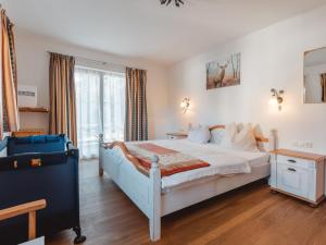 Posteľ alebo postele v izbe v ubytovaní Chalet Hochkrimml 2 by Interhome