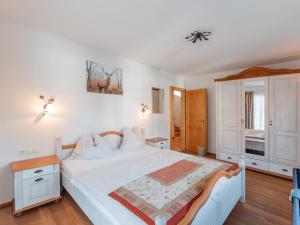 Posteľ alebo postele v izbe v ubytovaní Chalet Hochkrimml 2 by Interhome