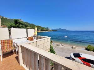 a balcony with a view of the ocean at Apartment Jelka-2 by Interhome in Trstenik