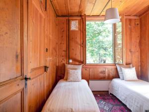 Letto o letti in una camera di Chalet Dufaux by Interhome