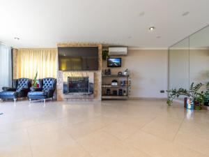 Posezení v ubytování Holiday Home Masia Blanca by Interhome + 32 fotografií