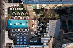 an overhead view of a building with a swimming pool at W Scottsdale in Scottsdale