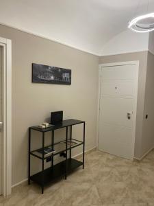 TV a/nebo společenská místnost v ubytování ROMA PARADISO GUEST HOUSE