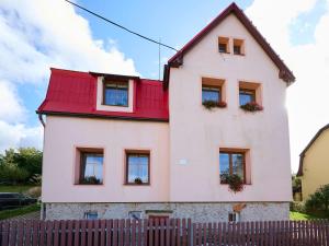 a white house with red roof at Apartment Formanka by Interhome in Liberec
