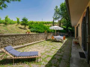 A garden outside Holiday Home Allodola by Interhome