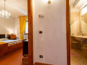 A bed or beds in a room at Holiday Home Allodola by Interhome