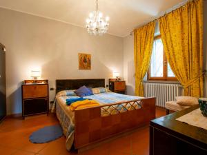 A bed or beds in a room at Holiday Home Allodola by Interhome