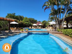 una piscina en el complejo en Corais e Conchas, en Búzios