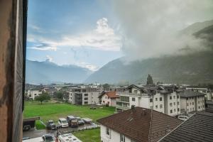 a view of a city with buildings and a mountain at Glishorn Blick , 3 Floor in Brig