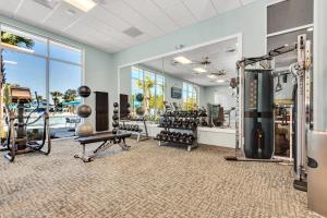 a fitness room with a gym with exercise equipment at Star Wars Moana Princess Mario Avatar Near Disney in Davenport