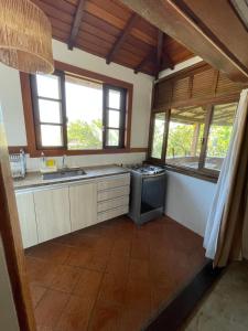 Kjøkken eller kjøkkenkrok på Casas loft em Armação dos Búzios