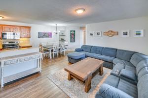 a living room with a couch and a table at Murrells Inlet Vacation Rental about 4 Mi to the Beach in Myrtle Beach