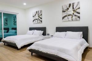 Voodi või voodid majutusasutuse Lake Home: Relax and Unwind in Mission Hidden Gem toas