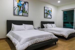 Voodi või voodid majutusasutuse Lake Home: Relax and Unwind in Mission Hidden Gem toas