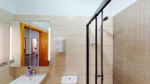 Koupelna v ubytování Triana Rooms EH + 22 fotografií