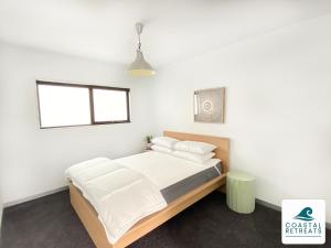 Ένα ή περισσότερα κρεβάτια σε δωμάτιο στο The Drift House Seagrove