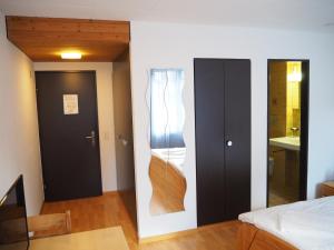Cama o camas de una habitación en Hotel Stadthof Glarus