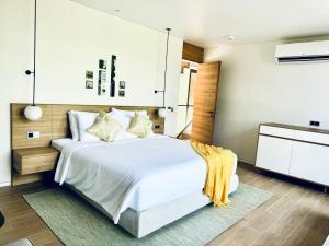 Krevet ili kreveti u jedinici u okviru objekta Lucie Villa Phu Quoc - 4 Bedroomss