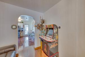 a room with a video game arcade in the corner at Spacious Retreat with Pool about 2 Mi to Hershey Park! in Hummelstown