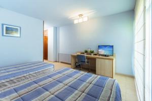 Posteľ alebo postele v izbe v ubytovaní Hotel Sausa