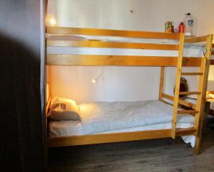 a couple of bunk beds in a room at Yard in Amora