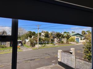 a view of a street from a window at Townhouse on Courtenay in New Plymouth