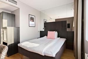 Postel nebo postele na pokoji v ubytování Aiden by Best Western Stockholm Solna