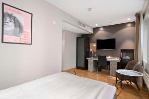 TV a/nebo společenská místnost v ubytování Aiden by Best Western Stockholm Solna
