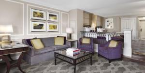 a living room with two couches and a table at The Venetian® Resort Las Vegas in Las Vegas