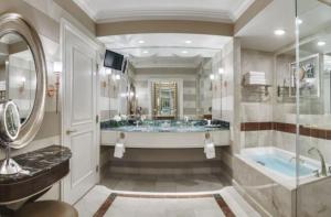 a large bathroom with a tub and a sink at The Venetian® Resort Las Vegas in Las Vegas