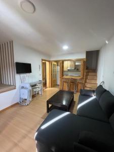 A television and/or entertainment centre at BUENAVISTA DELUXE