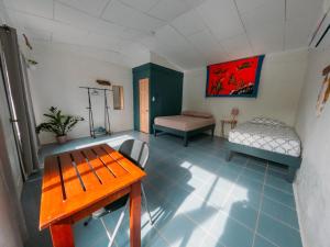 Postel nebo postele na pokoji v ubytování Rooms & Pool Macaws