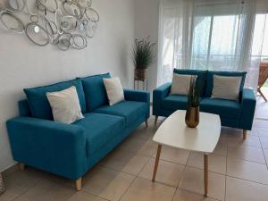 Istumisnurk majutusasutuses KANOA LODGE piscine et vue mer