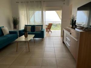 Köök või kööginurk majutusasutuses KANOA LODGE piscine et vue mer