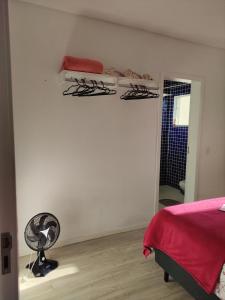 Postel nebo postele na pokoji v ubytování Quarto Privado com Suíte - Oktoberfest 10min