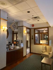 a lobby of a hotel with a waiting room at Kingston Hotel in Vancouver