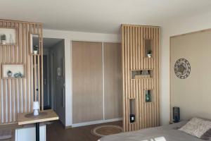 Un baño de F1 standing vue mer Anse Vata